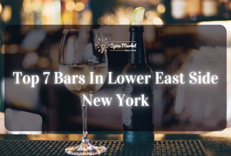 Top 7 Bars In Lower East Side New York - a bar with good lighting, a bottle and glass of alcohol on a table