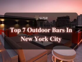 Top 7 Outdoor Bars In New York City - a beautiful view of an outdoor bar with nice sofas, tables and lighting