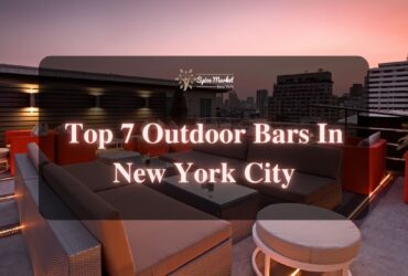 Top 7 Outdoor Bars In New York City - a beautiful view of an outdoor bar with nice sofas, tables and lighting